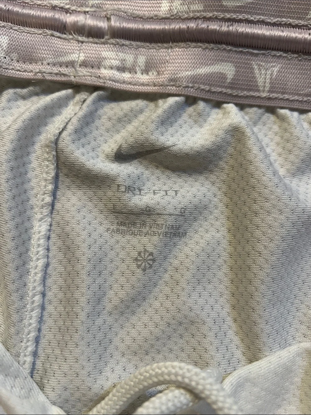 Nike Men’s White Athletic Shorts with Pale Pink Graphic